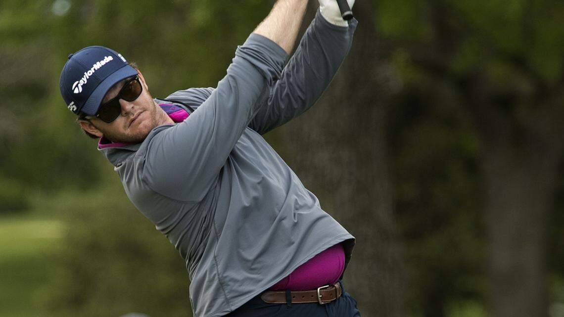Hometown favorite Harry Higgs tees off on the 17th hole during the KC Golf Classic in May at Blue Hills Country Club .