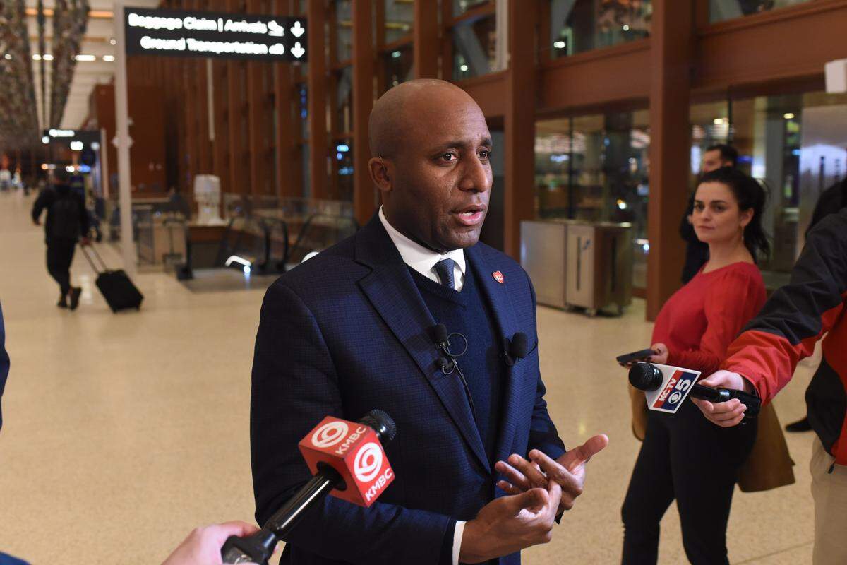 Kansas City Mayor Quinton Lucas spoke with reporters Tuesday at Kansas City International Airport after arriving home from a meeting in Dallas with future owners of the Country Club Plaza.