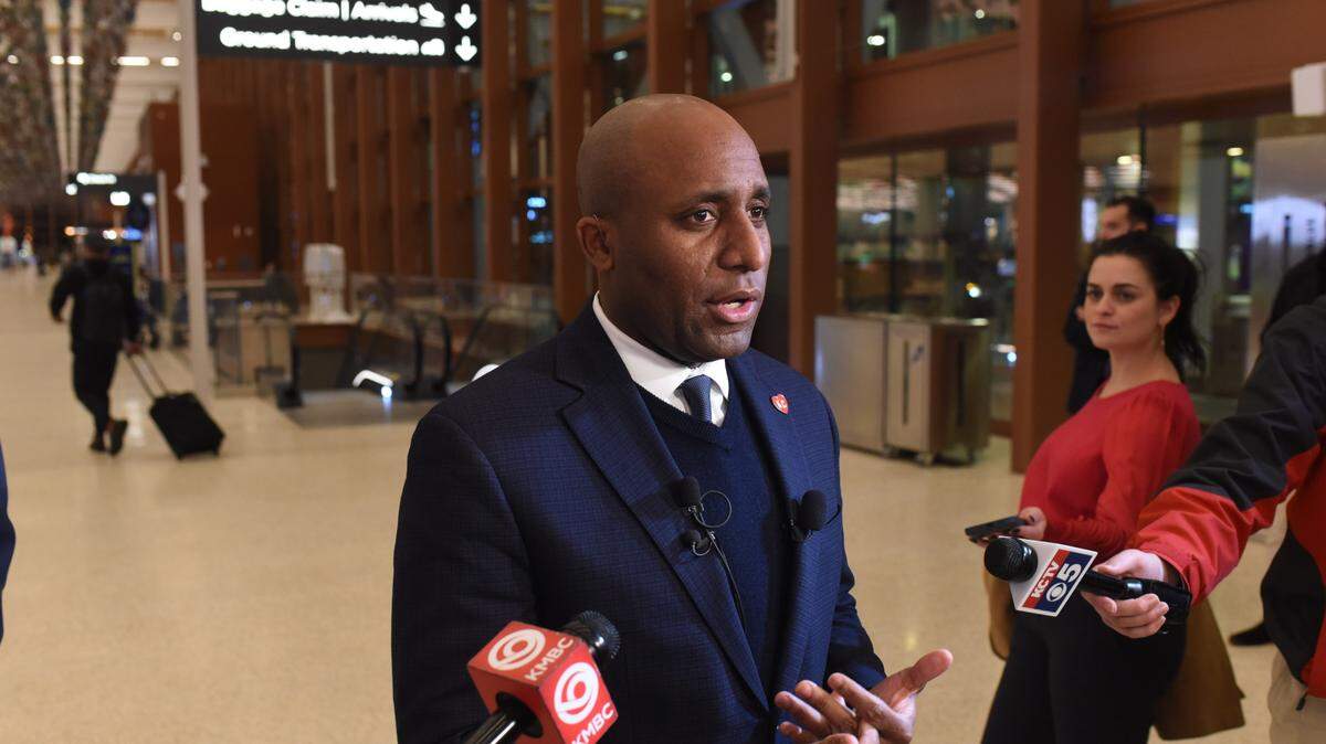 Kansas City Mayor Quinton Lucas spoke with reporters at Kansas City International Airport last December.
