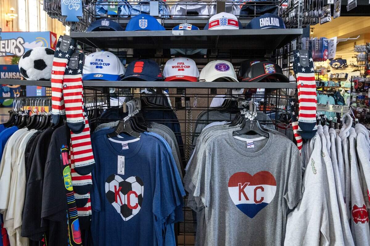 FIFA World Cup merchandise and soccer-themed Charlie Hustle shirts are displayed for sale at the Rally House inside Union Station on Tuesday, June 9, 2026, in Kansas City.