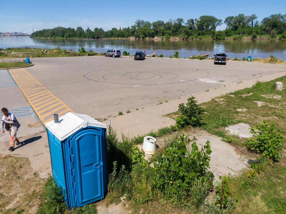 Riverfront Park sits on the banks of the Missouri River in Kansas City. The park has a porty-potty and boat ramp and is poorly maintained.