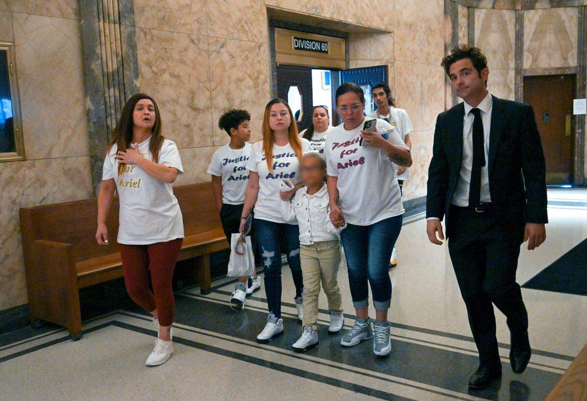 The family of Ariel Young leave the Jackson County Courthouse after Britt Reid was sentenced to three years in prison for driving while intoxicated and causing a 2021 crash that severely injured a 5-year-old Ariel.