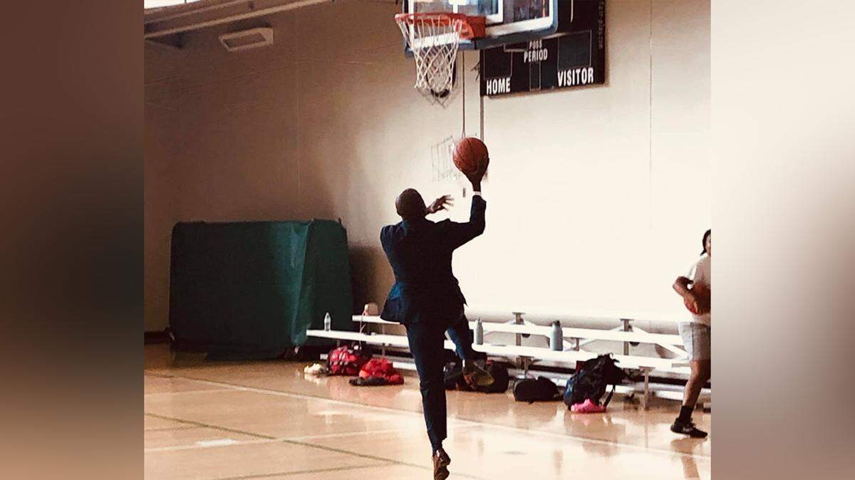 Kansas City Mayor Quinton Lucas plays basketball