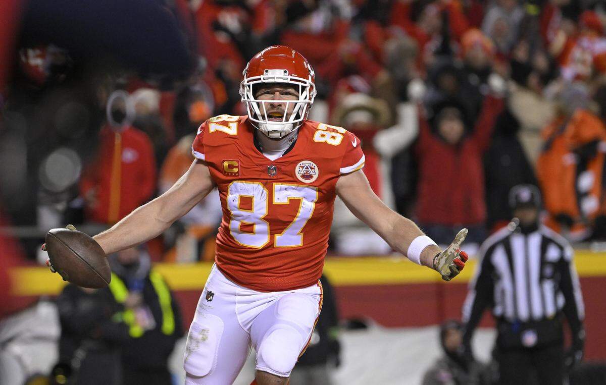 Chiefs tight end Travis Kelce gets in for a touchdown during the first half against the Cincinnati Bengals in the AFC Championship Game on  January 29, 2023, at GEHA Field at Arrowhead Stadium.