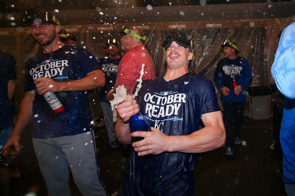Kansas City Royals shortstop Bobby Witt Jr. (7) celebrates after clinching a wild card playoff birth after a game against the Atlanta Braves at Truist Park.