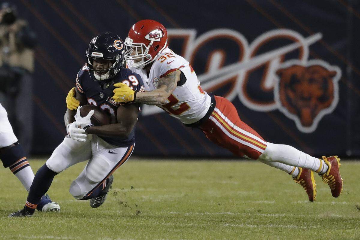 Kansas City Chiefs strong safety Tyrann Mathieu (32) tackles Chicago Bears running back Tarik Cohen (29) in the second half of an NFL football game in Chicago, Sunday, Dec. 22, 2019.