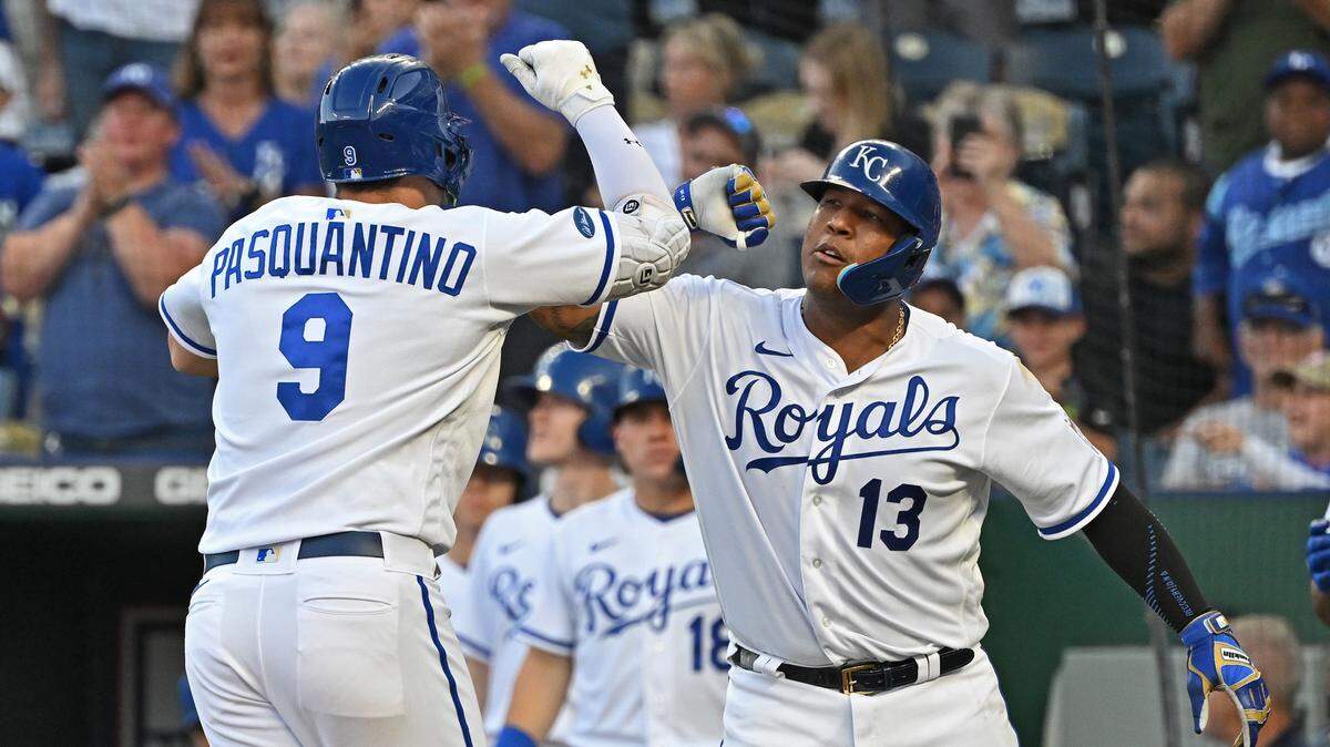 Sep 24, 2022; Kansas City, Missouri, USA; Kansas City Royals first baseman Vinnie Pasquantino (9) celebrates with catcher Salvador Perez (13) after hitting a two run home run against the Seattle Mariners during the first inning at Kauffman Stadium. Mandatory Credit: Peter Aiken-USA TODAY Sports