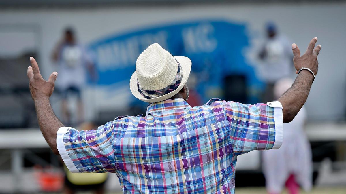 Eugene Coody of Kansas City listens to the music of Mind Body and Soul during Kansas City’s Juneteenth Heritage Festival in the 18th and Vine Jazz District Saturday, June 19, 2021.