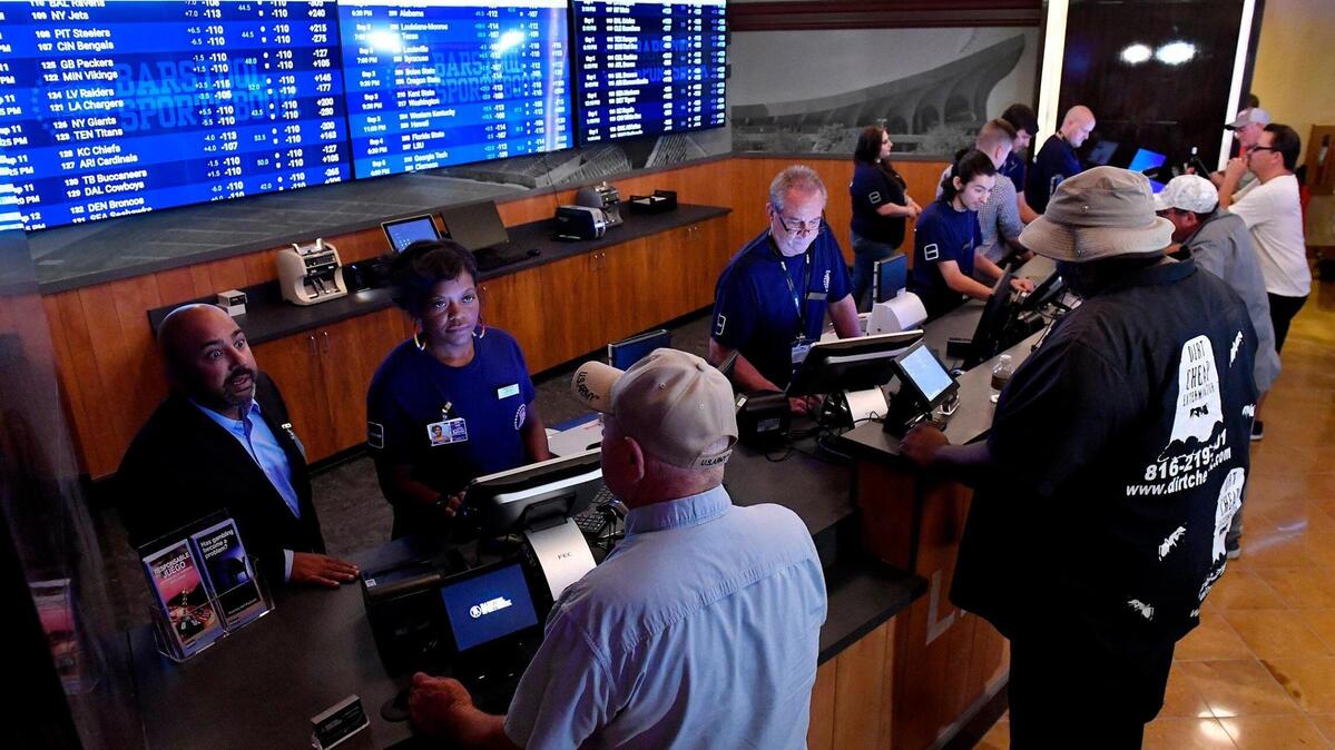 Legalized sports betting got underway Thursday in Kansas, including a location at the Hollywood Casino at Kansas Speedway, in Kansas City, Kansas. The betting windows opened first and it didn’t take long before money was exchanging hands. The temporary Barstool Sportsbook consists of 30 sports betting kiosks and five betting windows with odds boards and 45 high-definition televisions. The casino plans on opening a permanent Barstool Sportsbook in the fall.