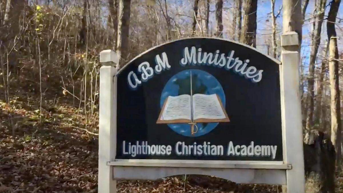 A sign marks the property of ABM Ministries’ Lighthouse Christian Academy in southeast Missouri. The unlicensed boarding school, which closed in March after its owners were charged with kidnapping a former student, remains under investigation by the Wayne County Sheriff over allegations of abuse.