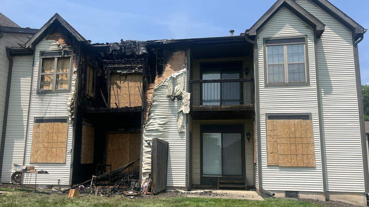 Charred debris on the back side of a Coach House apartment building that caught fire late night Sunday, June 1. The Bomb and Arson Unit of the Kansas City Police Department is investigating the incident.