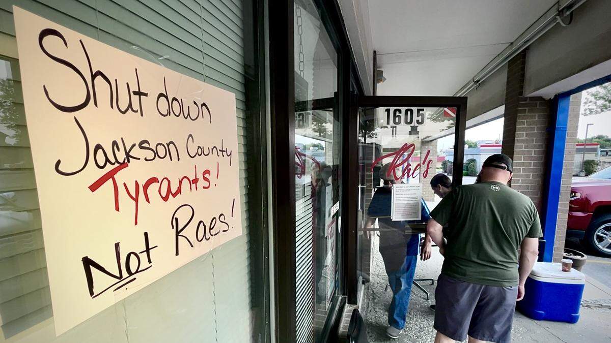 The fundraising site GoFundMe over the weekend pulled the page raising donations for Rae’s Cafe in Blue Springs which for weeks has been defying a local mask mandate. A customer is being allowed to enter the cafe on Friday after signing a ledger and paying a $1 fee.