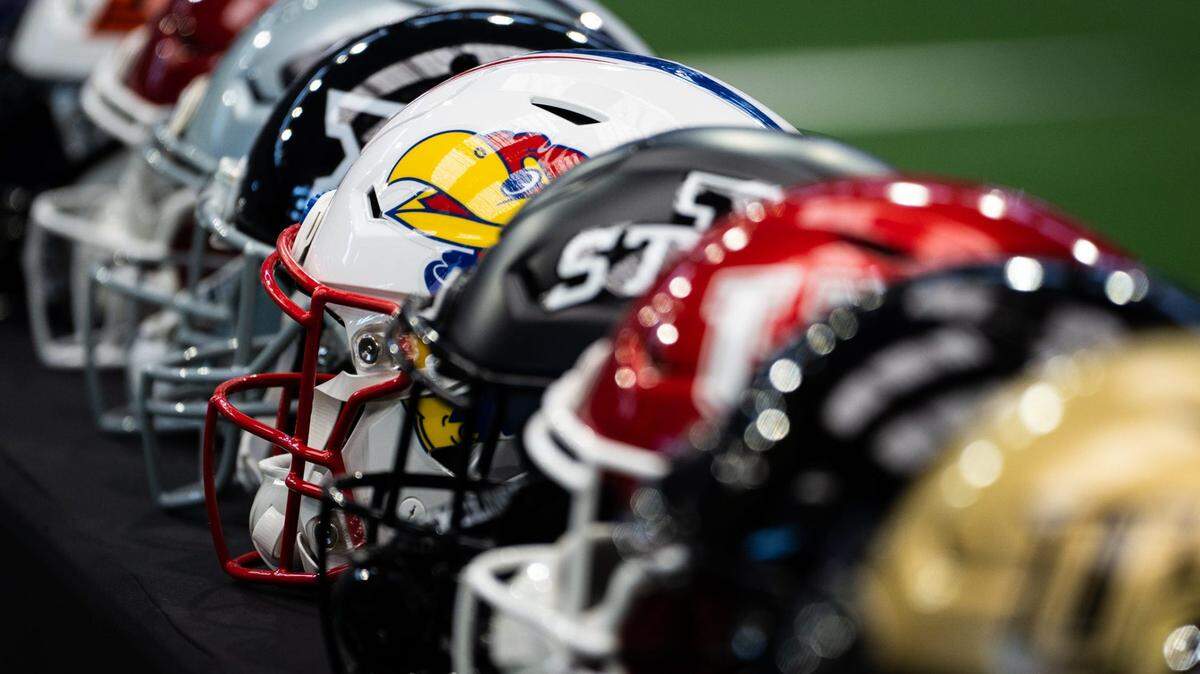 A football helmet from the University of Kansas on display during the first day of Big 12 Media Days in AT&T Stadium in Arlington, Texas, July 12, 2023.