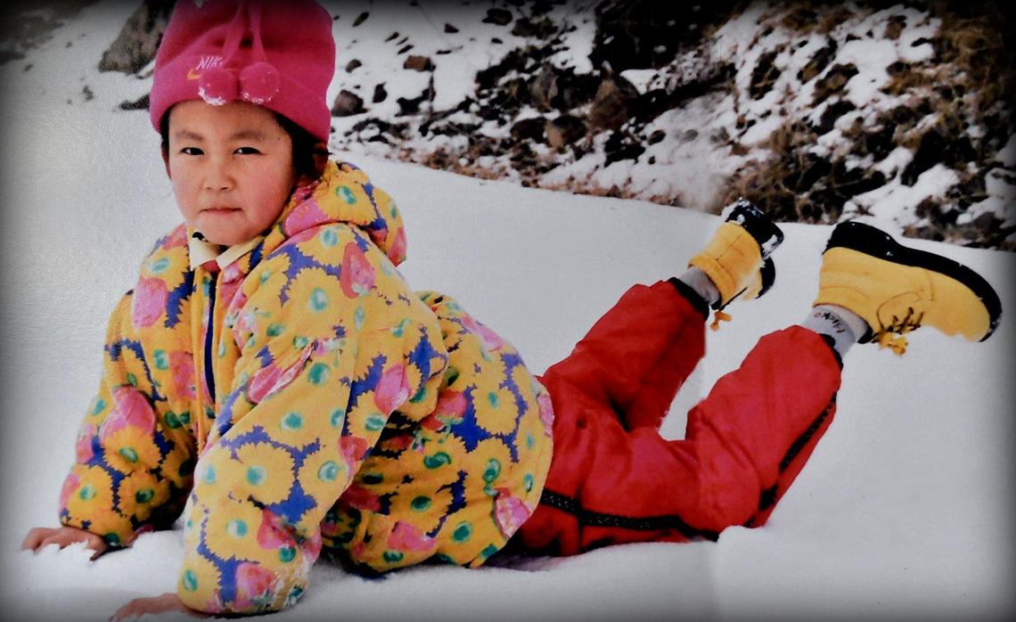 “Since she is a little girl she is always a good girl. She behaved well. She is always lively,” Ke Ren says of her daughter, Mengqi Ji, pictured in a family photo.