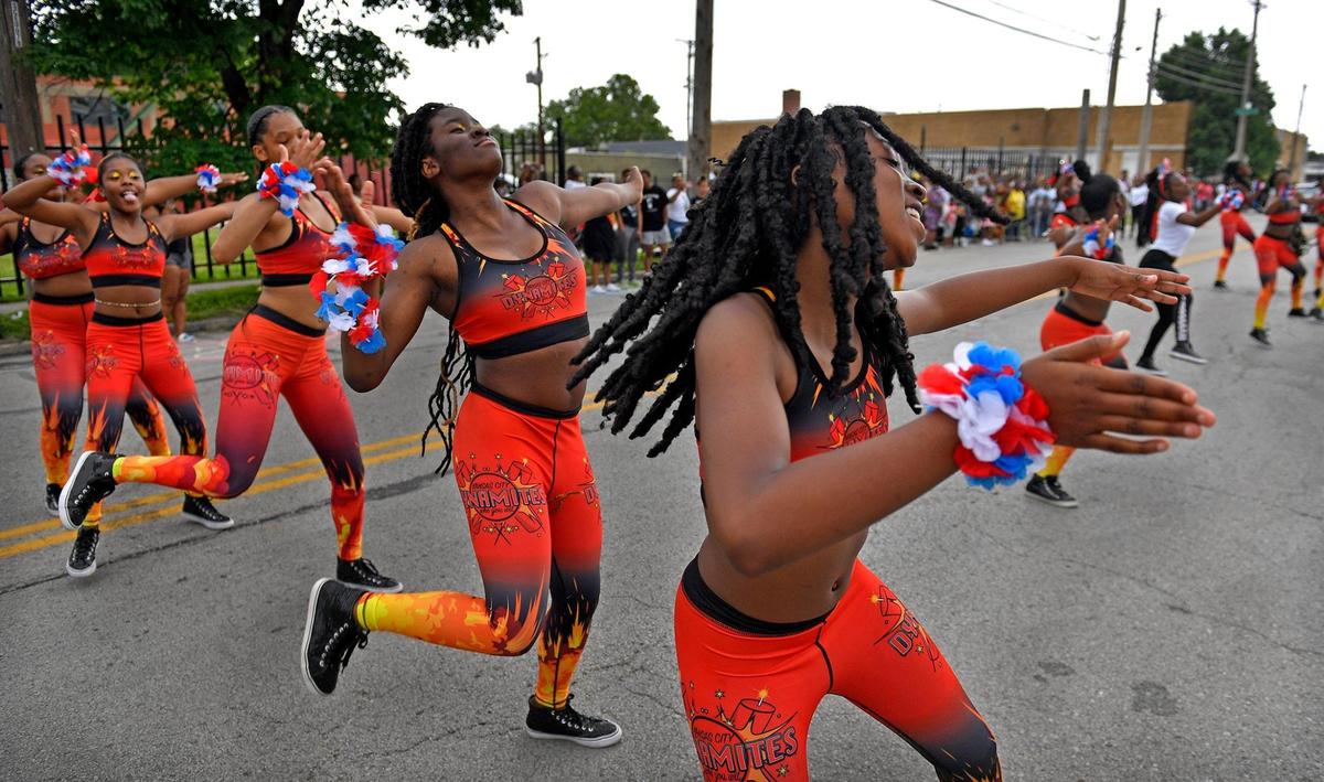Members of the Kansas City Dynamites perform Saturday afternoon at the JuneteenthKC Cultural Parade in the heart of the 18th and Vine Jazz District.
