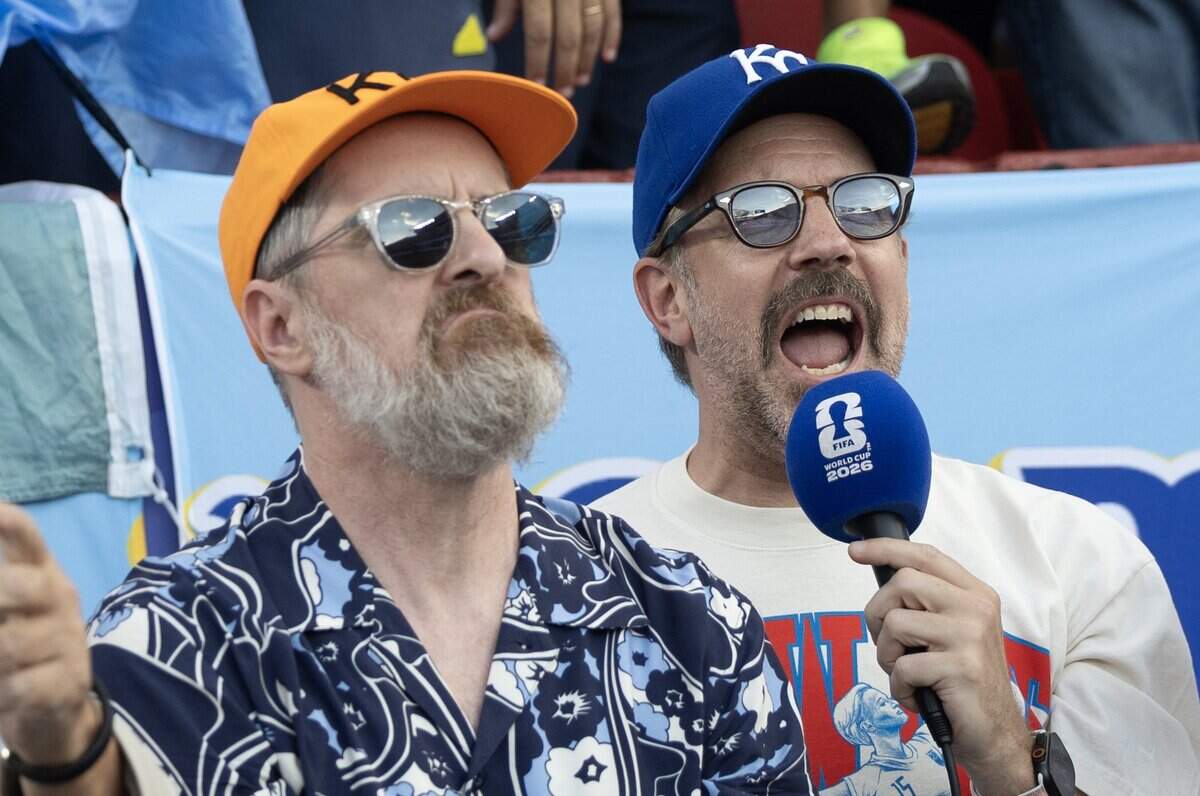 Jason Sudeikis, right, and his Ted Lasso co-star Brendan Hunt fire up the crowd before the FIFA World Cup quarterfinal match between Argentina and Switzerland at Kansas City (Arrowhead) Stadium in Kansas City on Saturday, July 11, 2026.
