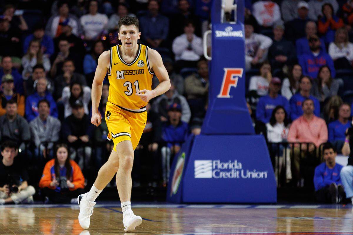 Jan 14, 2025; Gainesville, Florida, USA; Missouri Tigers guard Caleb Grill (31) runs against the Florida Gators during the first half at Exactech Arena at the Stephen C. O’Connell Center. 