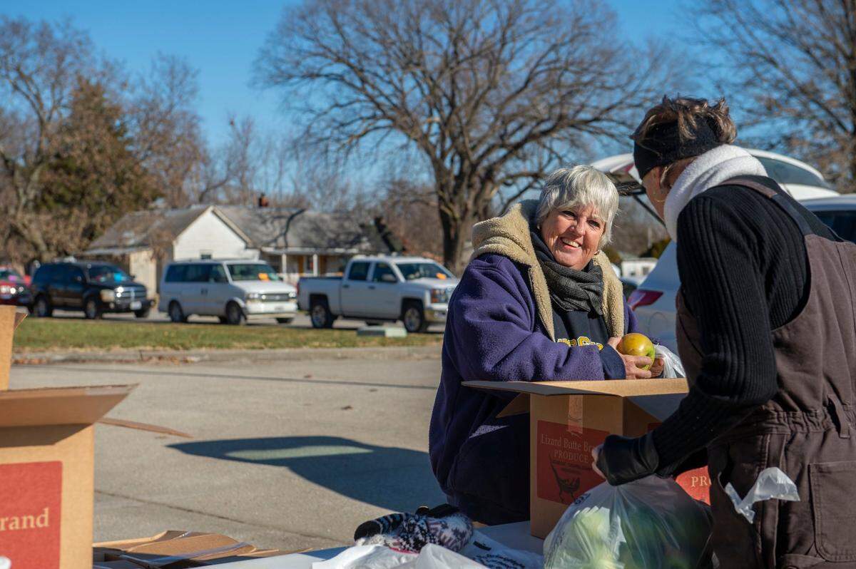 Deepwater Mayor Corrine Lesmeister volunteers at a food pantry on Dec. 6, 2021.