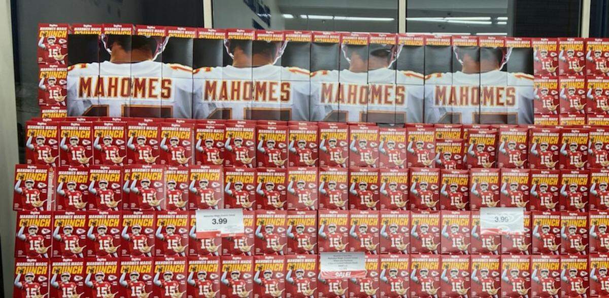 Eight different images on the cereal boxes combine to make a larger Patrick Mahomes photo.