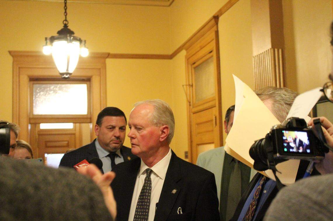 Senate Majority Leader Gene Suellentrop leaves a meeting with Republican lawmakers after making a statement behind closed doors. When asked for further comment, he declined and referred to his written statement.