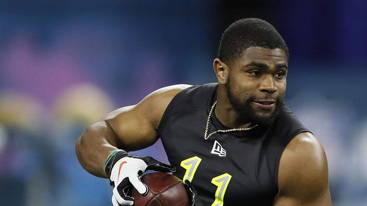 LSU running back Clyde Edwards-Helaire runs a drill at the NFL football scouting combine in Indianapolis, Friday, Feb. 28, 2020. (AP Photo/Charlie Neibergall)