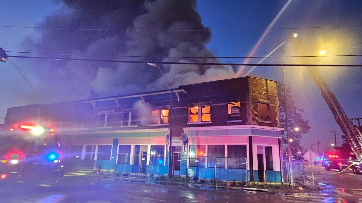 Kansas City firefighters fought a blaze in a vacant 8th Street building next to a City Union Mission warehouse Tuesday evening.