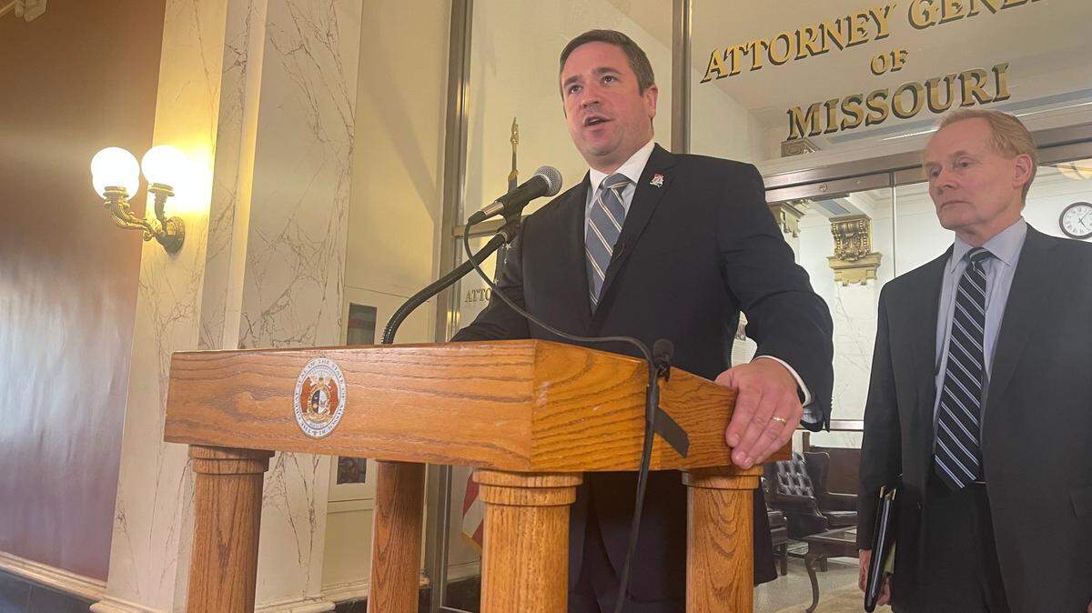 Missouri Attorney General Andrew Bailey, left, speaks to reporters during a press conference on May 3, 2023. He was joined by Bill Corrigan, right, the state’s deputy attorney general.