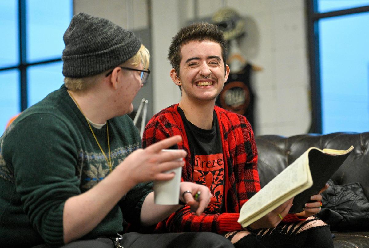 Zoe Dunning, right, and friend Dakota Niederhauser got together to share work and write poetry at Blip Roasters in the West Bottoms on Oct. 28. Dunning uses poetry and blogging to talk about their life.