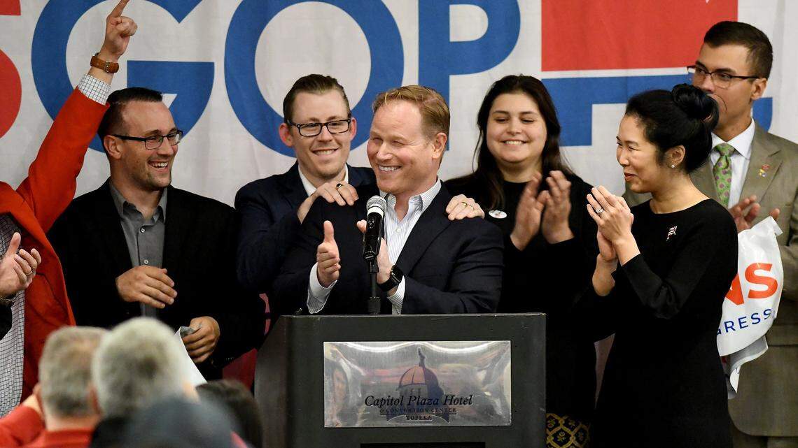 Steve Watkins thanks supporters after defeating Paul Davis in the Kansas 2nd Congressional District race in 2018. Watkins was joined by his wife Fong Liu and supporters onstage at the Republican watch party at the Capitol Plaza Hotel in Topeka.
