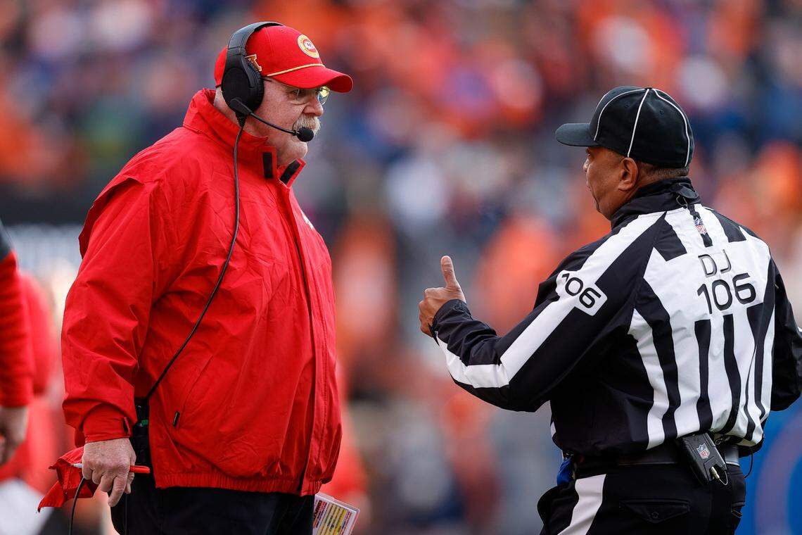 Kansas City Chiefs coach Andy Reid, left, talks with NFL down judge Patrick Holt after a play against the Broncos during the teams’ Week 18 game at Empower Field at Mile High in Denver on Sunday, Jan. 5, 2025.