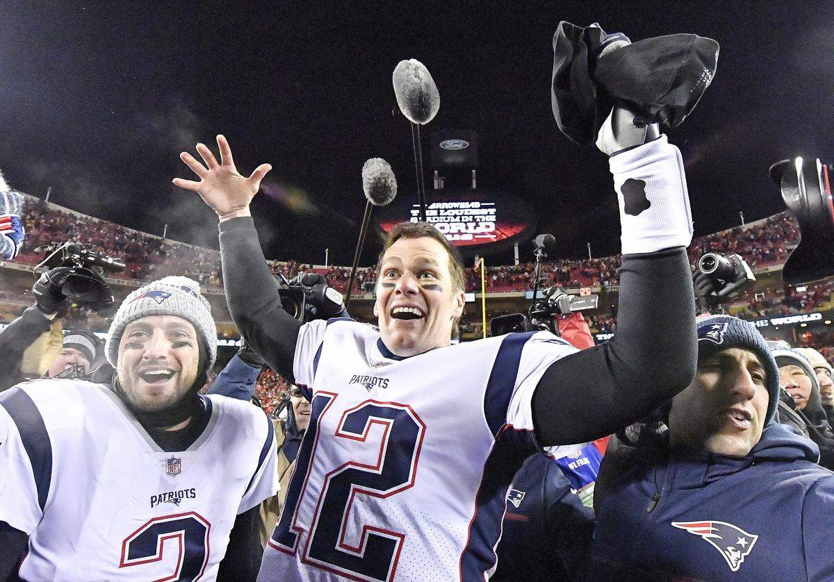 Patriots quarterback Tom Brady celebrates after New England scored the game-winning touchdown in overtime for a 37-31 win against the Chiefs.