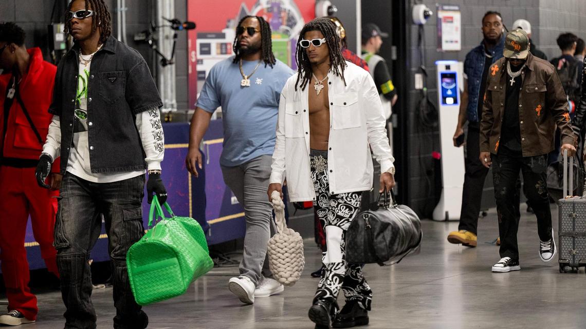 Kansas City Chiefs running back Isiah Pacheco, center, walks to the locker room after arriving at Allegiant Stadium for Super Bowl LVIII on Sunday, Feb. 11, 2024, in Las Vegas.