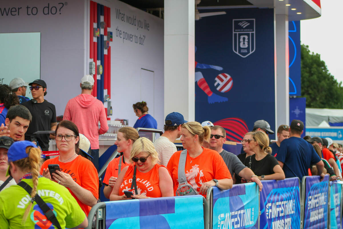 The line to get a custom fan band at the Bank of America station at Kansas City Fan Fest.