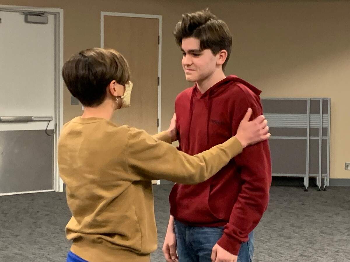 Ben Renfrow, right, is one of three actors who play Jack Mandelbaum in “Surviving Hitler.” He rehearses with Ashton Botts, who plays Jack’s aunt. The new play based on Mandelbaum’s life will run April 9-14 at the Jewish Community Center’s Lewis and Shirley White Theatre.