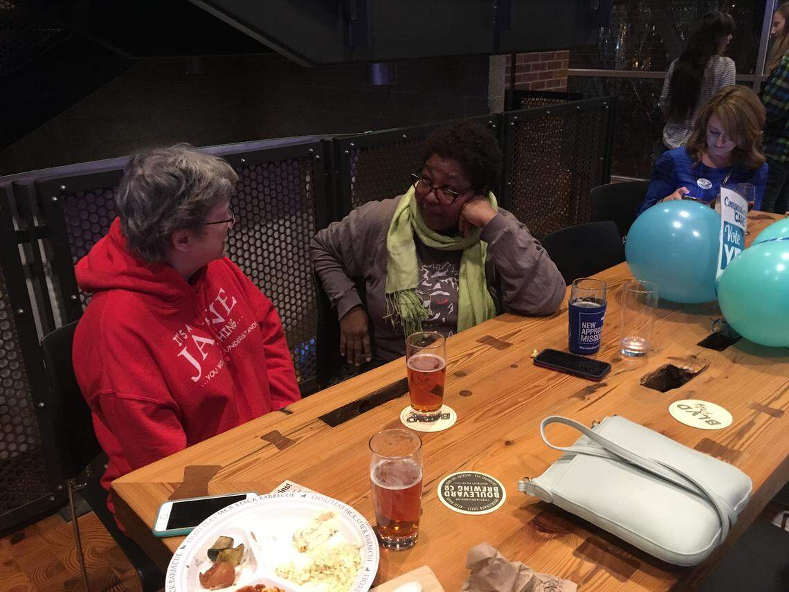 Jane Gold (left) said she wants to try marijuana for her arthritis. Julita Latimer said she wants to open a dispensary. The two chatted during a watch party Tuesday for Amendment 2, which legalizes medical marijuana in Missouri.