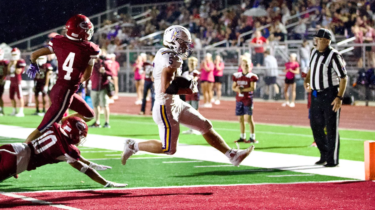 Spring Hill’s Colton McKanna scores a touchdown during a 31-28 win Friday night at Eudora.