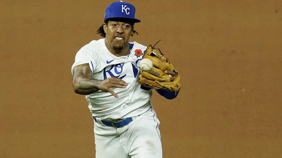 Kansas City Royals shortstop Adalberto Mondesi throws during the eighth inning of a baseball game against the Pittsburgh Pirates Monday, May 31, 2021, in Kansas City, Mo. (AP Photo/Charlie Riedel)