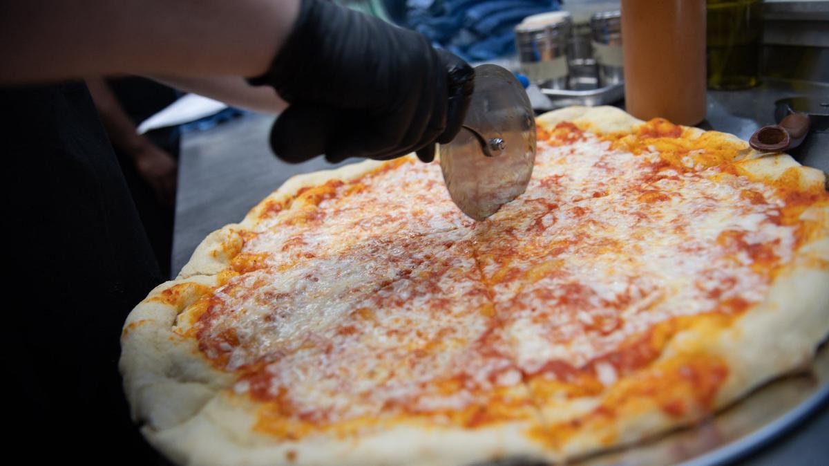 A simple mozzarella cheese pie at City Barrel Pizza + Patio, which opens Friday.