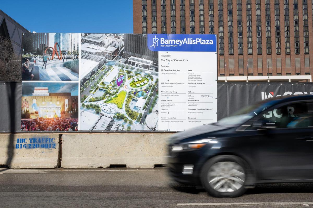 A sign displaying the renderings of Barney Allis Plaza redevelopment stands along West 13th Street on Tuesday, Feb. 25, 2025, in Kansas City.