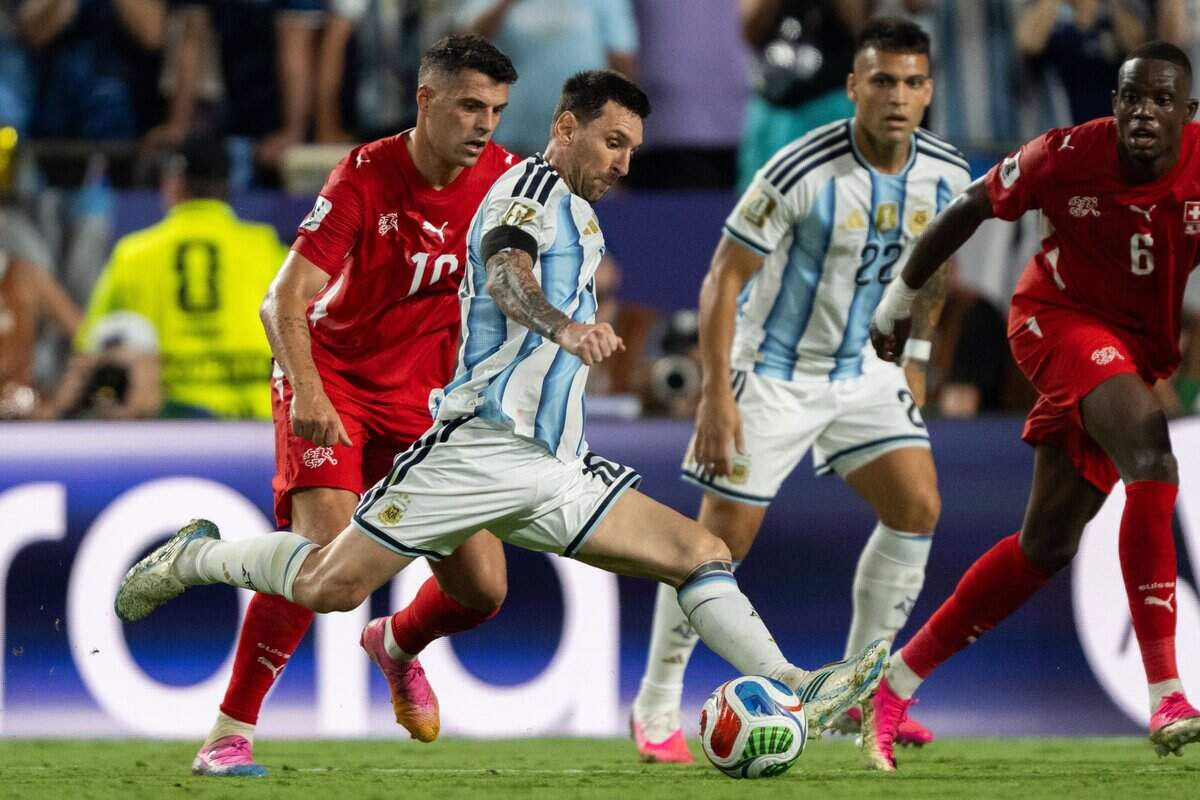 Argentina forward Lionel Messi (10) takes a shot at the goal in a 2026 FIFA World Cup quarterfinal match at Kansas City (Arrowhead) Stadium in Kansas City on Saturday, July 11, 2026.