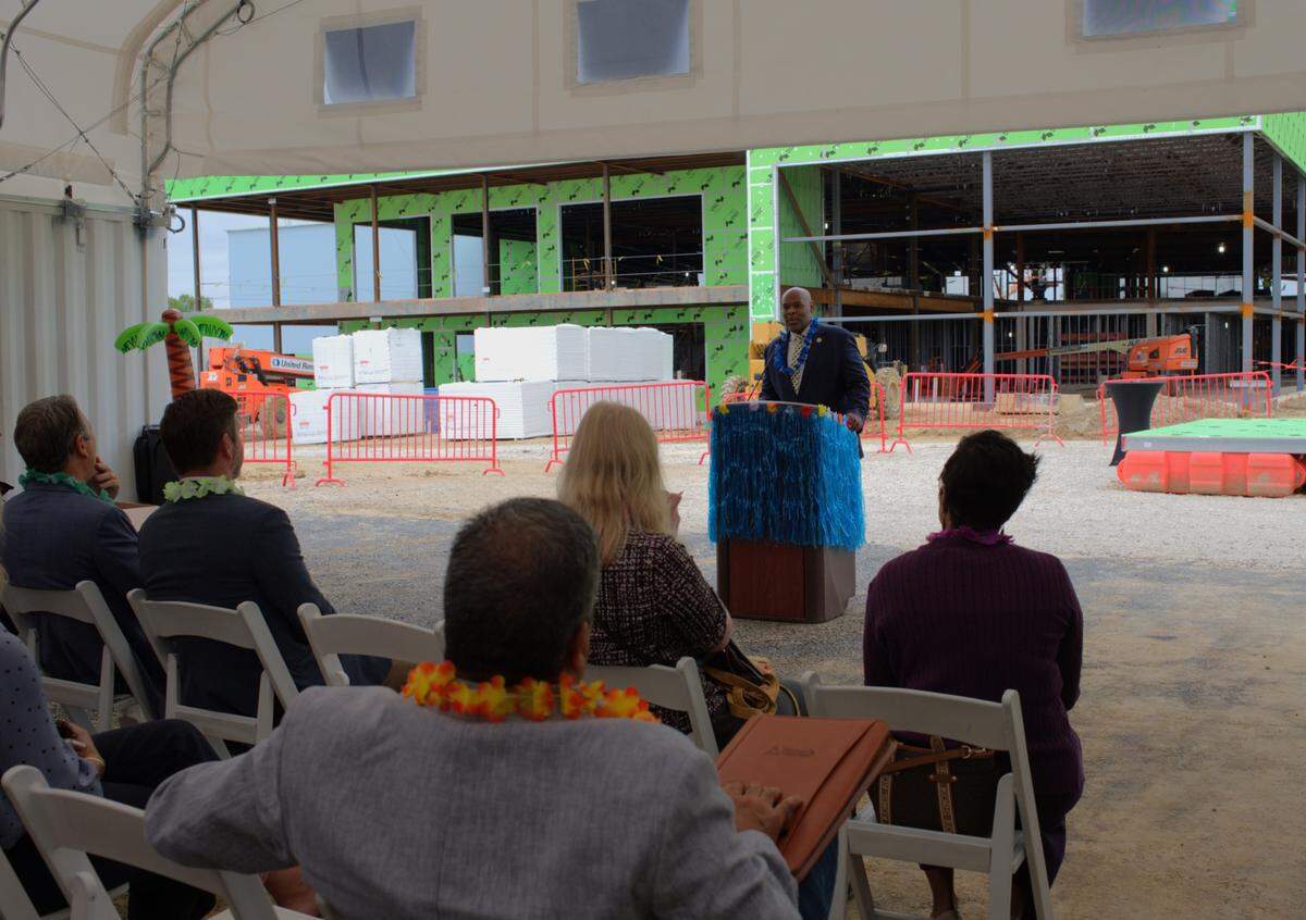 Mayor Tyrone Garner delivers remarks Wednesday, May 8, 2024, during a ceremony at the site of the under-construction Margaritaville Hotel in western Kansas City, Kansas.