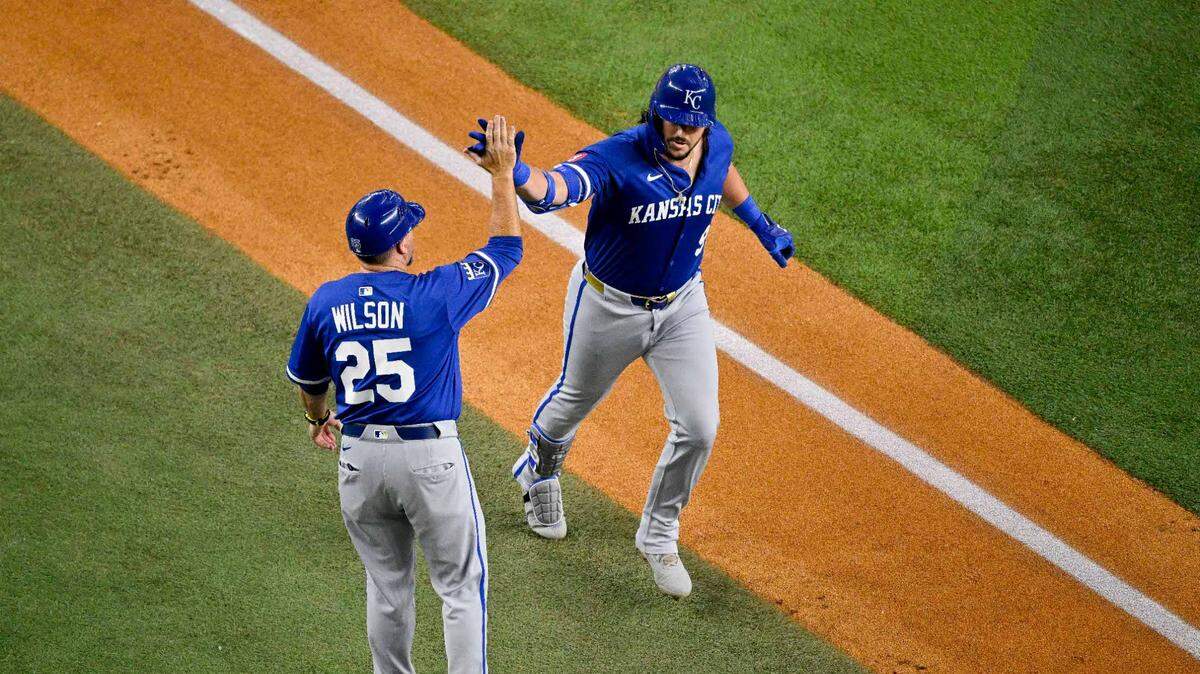 Kansas City Royals first baseman Vinnie Pasquantino (9) rounds the bases past third base coach Vance Wilson (25) after a two-run home run against the Texas Rangers during the first inning at Globe Life Field on June 19, 2025.