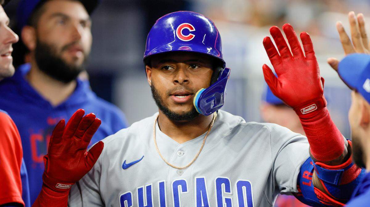 Chicago Cubs designated hitter Nelson Velazquez (4) celebrates with teammates after hitting a home run during the third inning against the Miami Marlins at loanDepot Park on April 28, 2023.