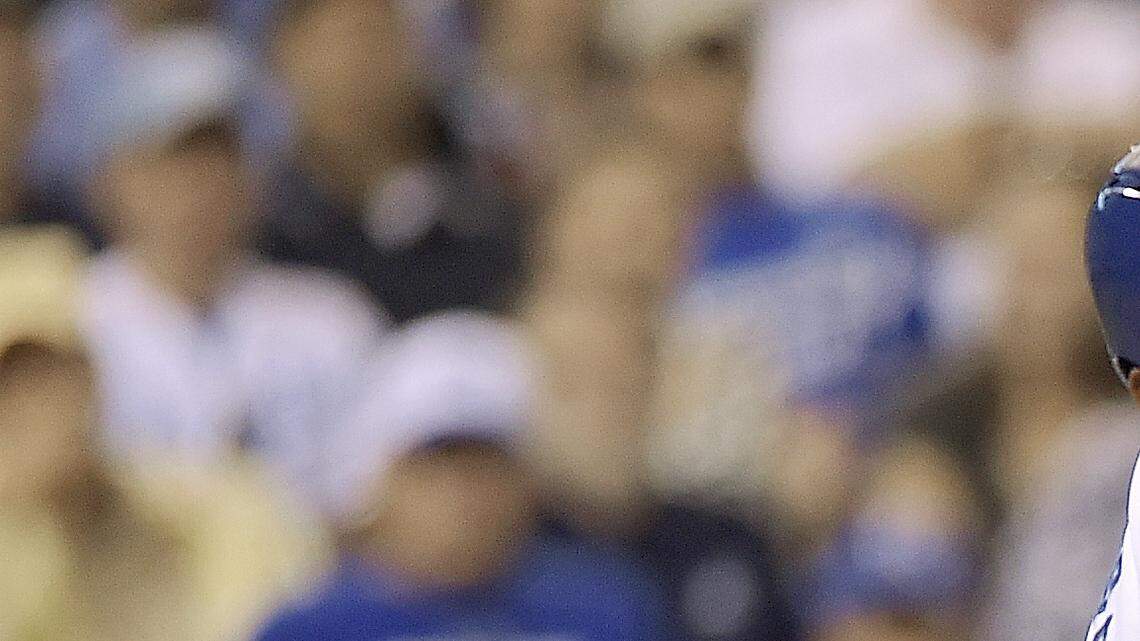 The Royals' Alcides Escobar lines up an RBI single that scored teammate Norichika Aoki for the go-ahead run in the seventh inning of Monday's baseball game against the Athletics at Kauffman Stadium.