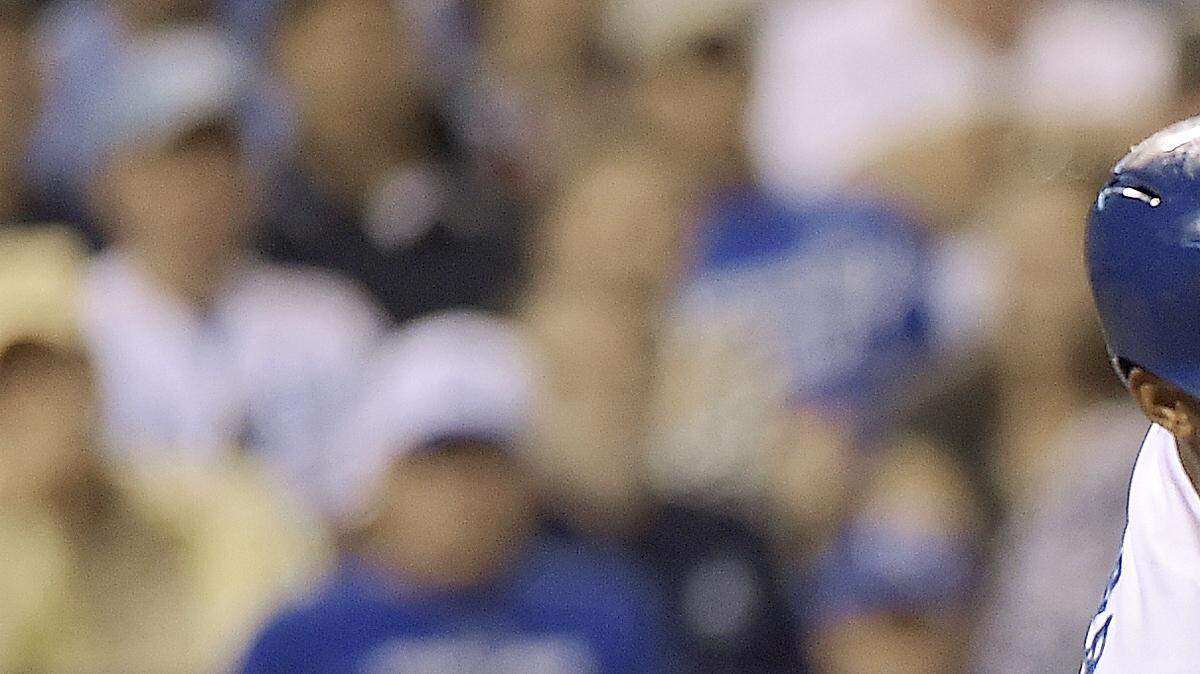 The Royals' Alcides Escobar lines up an RBI single that scored teammate Norichika Aoki for the go-ahead run in the seventh inning of Monday's baseball game against the Athletics at Kauffman Stadium.