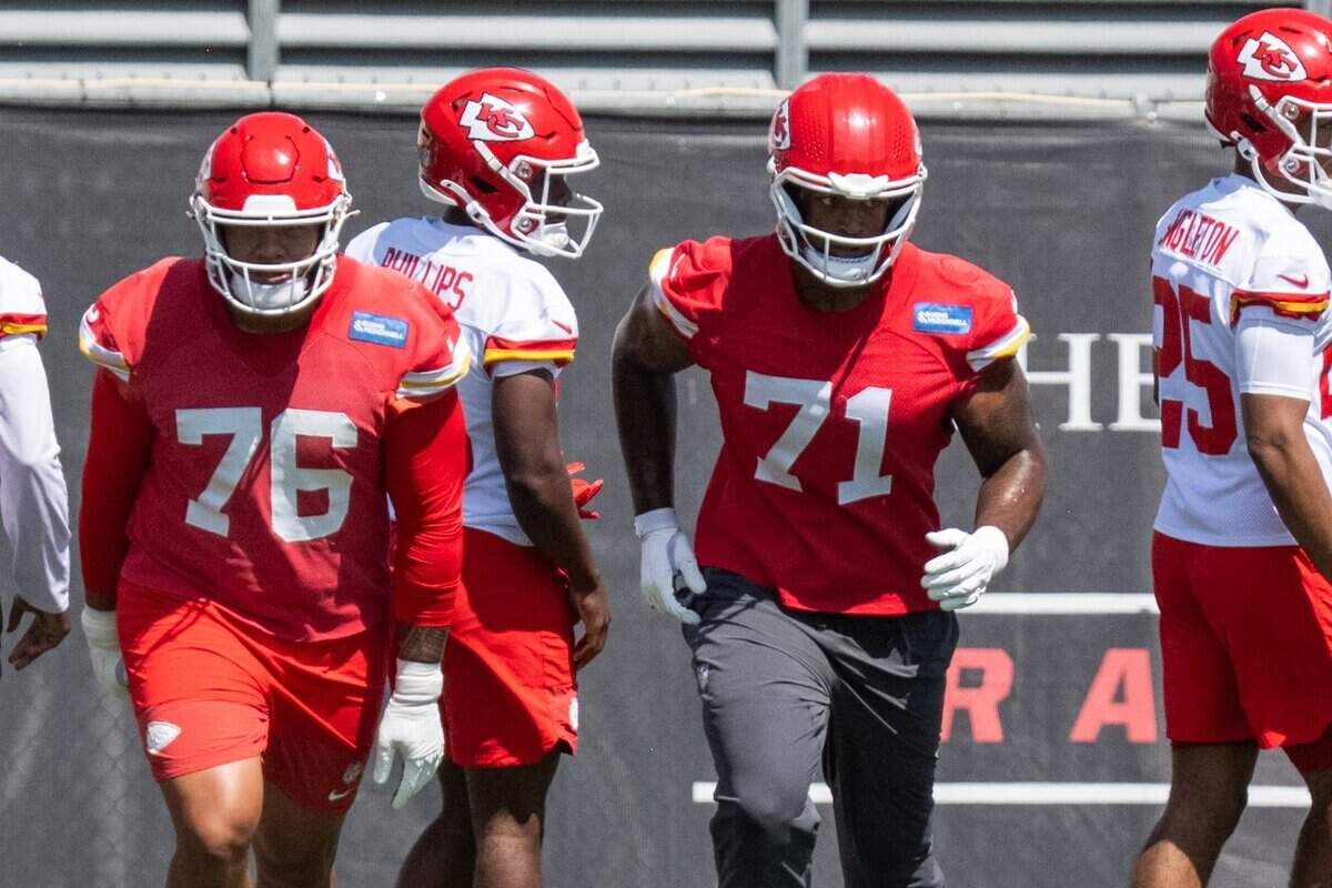 Kansas City Chiefs offensive lineman Josh Simmons jogs during warms up on the first day of minicamp, Tuesday, June 9, 2026, in Kansas City.