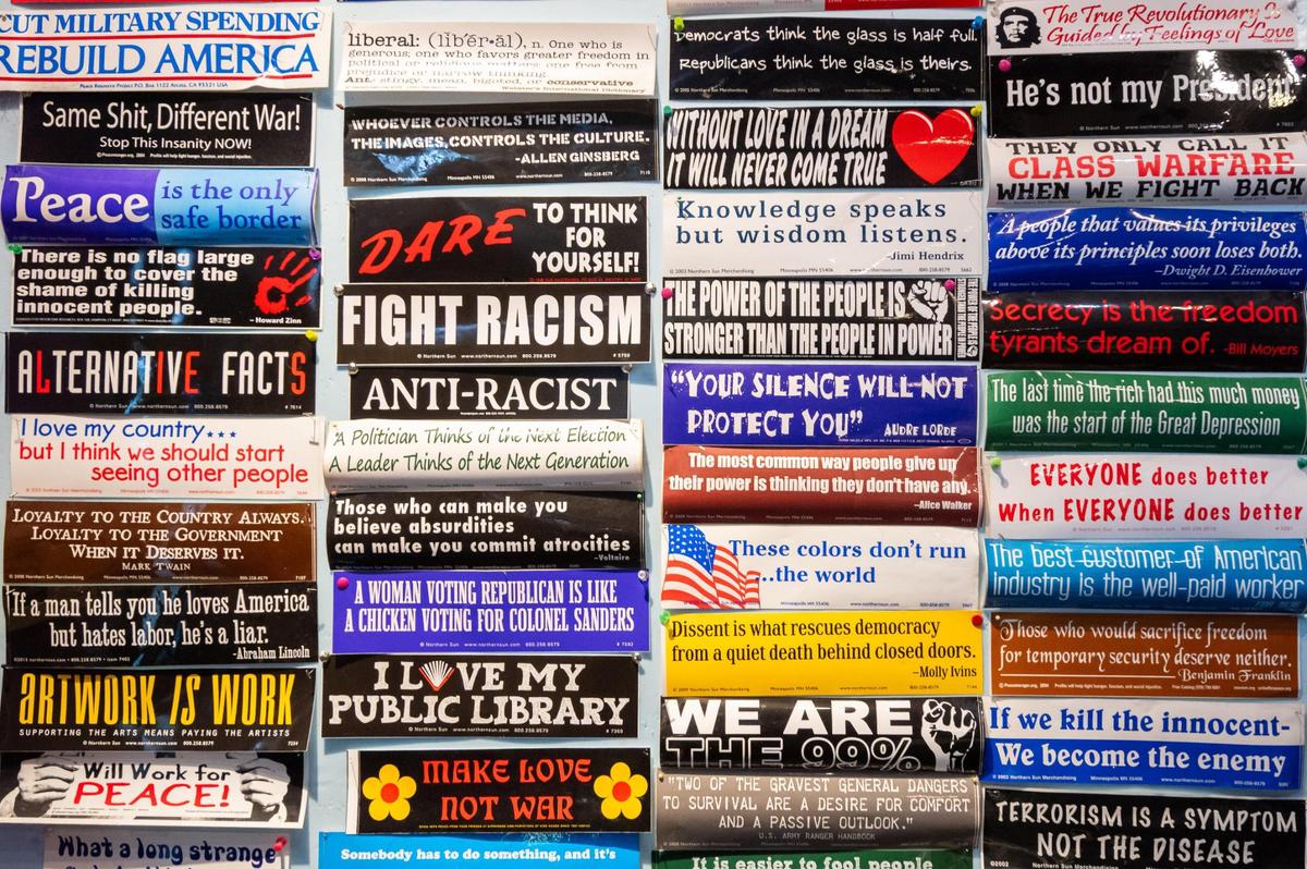 Political bumper stickers line an entire wall at It’s a Beautiful Day. The Westport shop, which has been open for 35 years, sells art, clothing, vinyl, and music equipment.