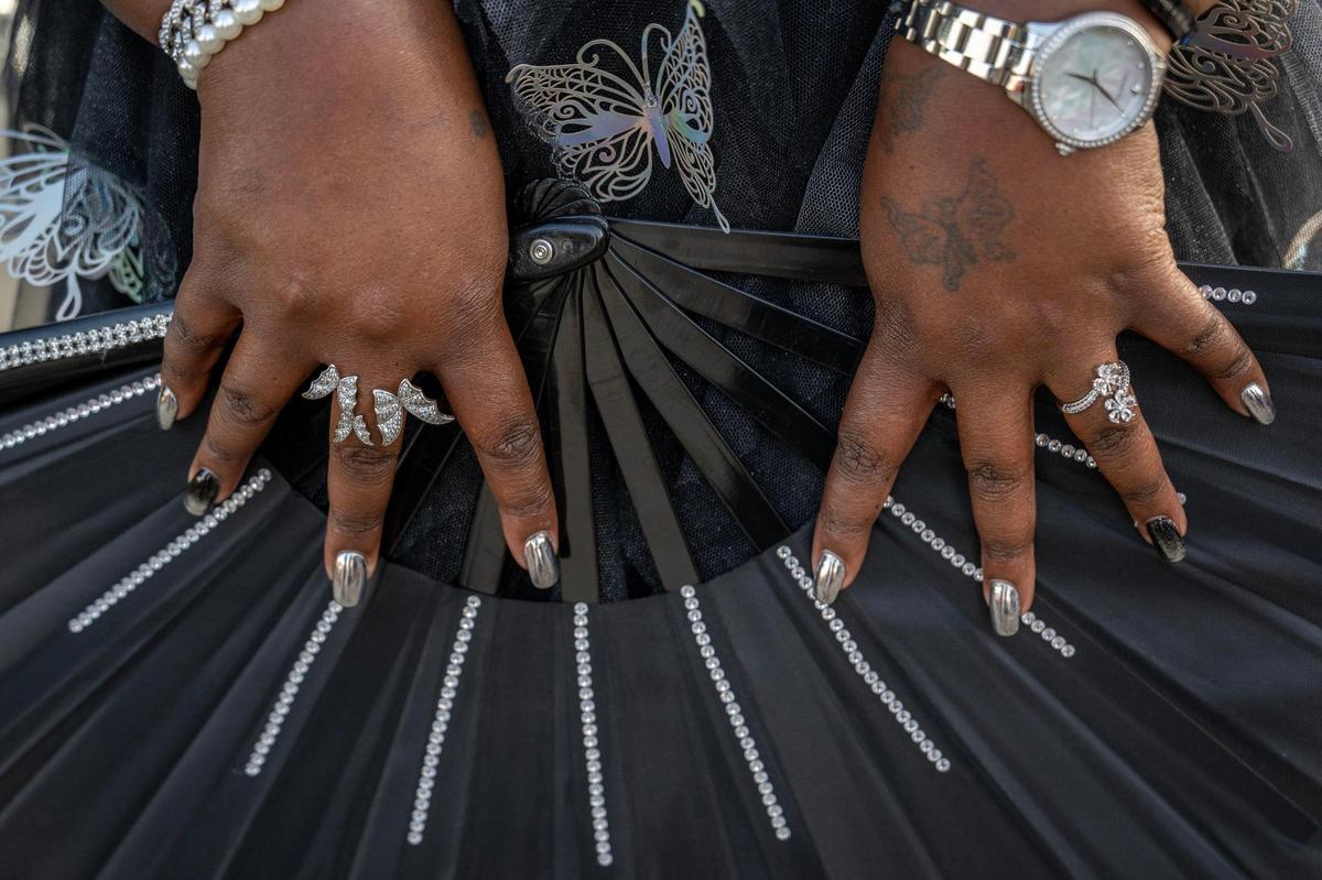 Veronica McDowall, from Orlando, Florida, shows off her silver nails before attending the last stop of Beyoncé’s Renaissance World Tour at GEHA Field at Arrowhead Stadium on Sunday, Oct. 1, 2023, in Kansas City.