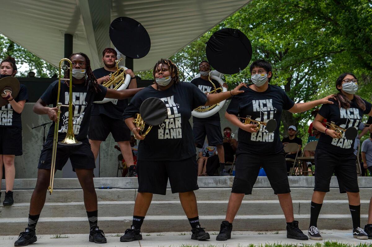 Members of the KCK All Star Band perform at the second annual Advocacy and Awareness Peace March and Rally on Juneteenth, Saturday, June 19, 2021, at Thompson Park in Overland Park, Kansas. Community members clapped and danced as the band performed.
