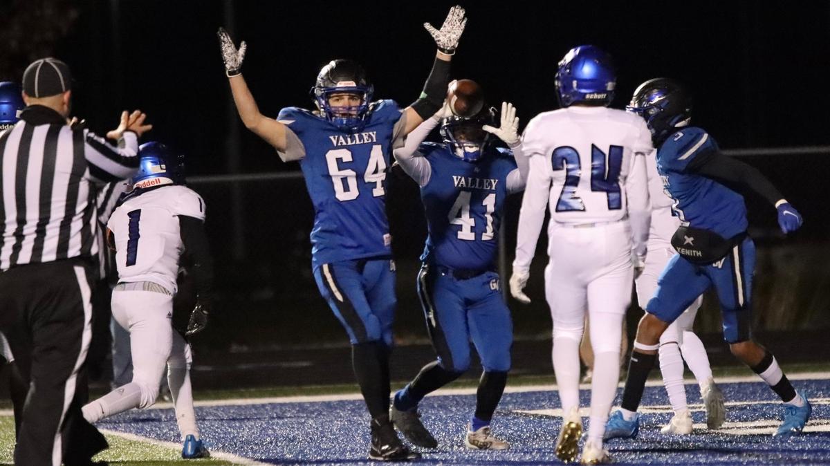 Grain Valley beat Raytown 38-37 in overtime Friday night to claim the Missouri Class 5 District 7 championship and advance to the round of eight in high school football.